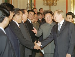 Moscow, russia, august 4, 2001, north korean leader kim jong-il, 2nd right, introduces the members of his delegation to president vladimir putin, right, prior to the talks in an extended format in the...