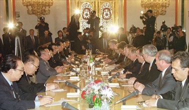 Moscow, russia, august 4, 2001, president vladimir putin, 5th right, and north korean leader kim jong-il, 4th left, pictured at the talks held in an extended format in the kremlin here on saturday.