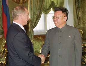 Moscow, russia, august 4, 2001, russian president vladimir putin, left, and north korean leader kim jong-il shaking hands at their talks in the kremlin here on saturday.