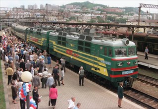 Vladivostok, russia, moscow to vladivostok train with veteran railway workers, famous writers and journalists pulls into rail station in vladivostok after a 9288 km (5,771 m) long journey marking the ...