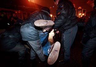 Moscow, russia, december 5, 2011, police detain demonstrators during an opposition protest in central moscow against alleged vote-rigging in the december 4 parliamentary election.