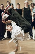 Tas35:chelyabinsk,russia, november 11, a participant performs during the urals open break-dance contest in chelyabinsk, the event drew over 30 teams.