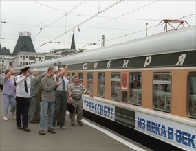 Moscow, russia, july 9, 2001, friends and relatives seeing off passengers of the special train, which headed from moscow's yaroslavsky terminal to vladivostok, on monday, the train marks the 100th ann...