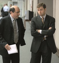 State duma deputies boris berezovsky (left) and roman abramovich in the foyer of the state duma after a regular sitting, moscow, russia, june 23, 2000.