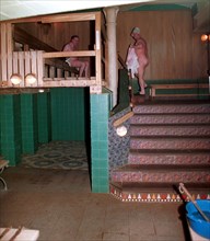 Two men inside the sanduovskiye bathhouse, popularly known as sanduny, the bathhouse is 105 today, it was named after a known russian actor sila nikolayevich sandunov and was made famous by its visito...