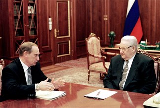 Moscow, russia, march 25, 1999, russian president boris yeltsin (r) talking with director of the russian federal security service (fsb) vladimir putin in the kremlin,on monday vladimir putin was appoi...