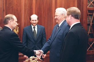 Moscow, russia, august 9, 1999, sergei stepashin (r), russian president boris yeltsin (second right), alexander voloshin (center) and vladimir putin, president boris yeltsin dismissed sergei stepashin...