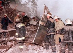 Moscow, russia, september 13, 1999, rescuers shown working at the rubble of the apartment block that was blasted last night on moscow's kashirskoye shosse, southeasteen municipal district, here on mon...
