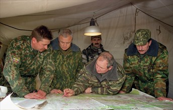 Chechnya, russia, december 10, 1999, commander of eastern army group gennady troshev (second right) seen assigning a mission during combat operations at the chechen town of argun, located approximatel...