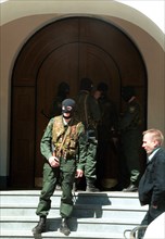 Moscow, russia, may 11, 2000, the tax police officers wearing masks seen at the entrance of the office of media-most holding, headed by vladimir gusinsky, where searches were made in connection with c...