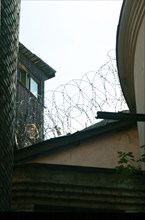 Moscow, russia, june 15, , a barbed wire pictured on the fence of the butyrka investigation ward in downtown moscow, where the head of the russian media-most holding vladimir gusinsky is kept for the ...