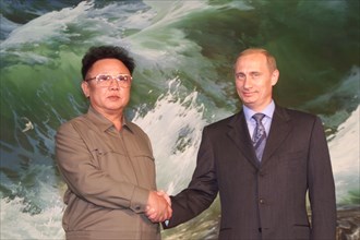 Pyongyang, july 20, 2000, north korean leader kim jong il (left) and russian president vladimir putin shake hands after they signed a joint declaration in pyongyang on wednesday, under the declaration...