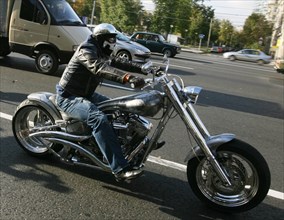 Biker attends the harley-davidson moscow show held to mark the closure of the 2006 summer bike season,  october 2, 2006.