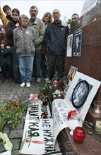 Meeting to commemorate journalist anna politkovskaya, who was murdered in her apartment block in central moscow on saturday evening, is staged in pushkin square, moscow, russia, october 8, 2006.