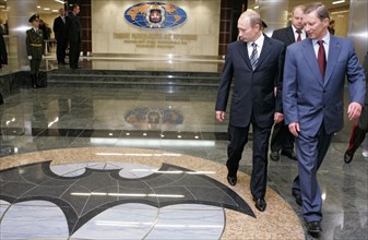 Russian president vladimir putin and russian defence minister sergei ivanov, l-r, visit a new headquarters of the main intelligence agency (gru) of the russian armed forces general staff, moscow, russ...