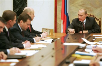 Defence minister sergei ivanov, first deputy prime minister dmitry medvedev, prime minister mikhail fradkov and russian president vladimir putin (l-r) seen at a meeting with the cabinet ministers in t...