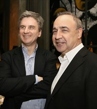 Highland gold mining pr director vladimir yakushkin and access industries president leonard blavatnik, l-r, pictured before a reception to mark the opening of the ll moscow biennale of contemporary ar...