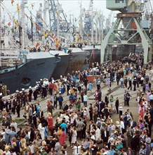 People welcoming ships at the port of vladivostok, ussr, 1975.