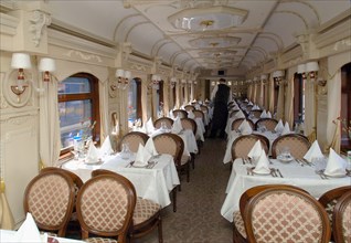 Moscow, russia, june 4, 2007, inside the dining car of the golden eagle express, the new $25 million fully en-suite private train has been launched by long-distance luxury train operator gw travel lim...