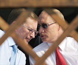 Russiai´s first deputy pm sergei ivanov and russian president vladimir putin, l-r, talk at the 8th international aviation & space salon maks 2007  in the town of zhukovsky, moscow region of russia, au...