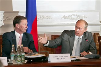 Russian president vladmir putin (r) and first deputy prime minister sergei ivanov at a meeting of russia's state council on fishing industry issues, astrakhan region, russia, august 31, 2007.