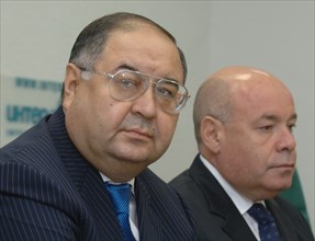 Moscow, russia, october 2, 2007, gazprominvestholding general director alisher usmanov (l) and chairman of the russian federal agency for culture and cinematography mikhail shvydkoi at a press confere...