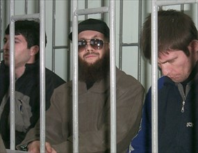 Makhachkala, dagestan, russia, november 15, 2001, chechen terrorist salman raduyev (centre) pictured in the dock, as today, thursday, he and his three accomplices have been put on trial for organizati...