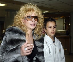 Singer irina allegrova with grandson sasha at the olympiysky sports complex, moscow, russia, december 10, 2007.