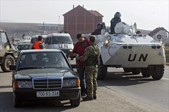 Vehicles at the crossing point in surroundings of pristina, the capital of kosovo, february 25, 2008.