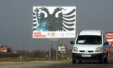 Billboard ad promoting political alliance between the u,s, and kosovo, outside pristina, kosovo, february 25, 2008.