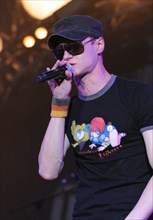 Vocalist of the ukrainian hip-hop band bumboks andriy hlyvnuk performs at the international rock festival maxidrom-2008 in the olympiysky sports complex,  june 14, 2008.