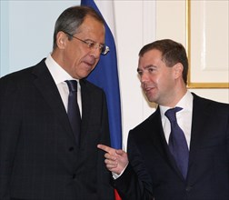 Russian president dmitry medvedev and russian foreign minister sergei lavrov (r-l) talk after the accomplishment of the russian- armenian talks, yerevan, armenia, october 21, 2008.