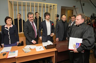 Suspects of murder of journalist anna politkovskaya, pavel ryaguzov and ibragim makhmudov (l-r, background) appear during the hearing of moscow district military court, moscow, russia, november 17, 20...
