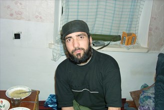 Moscow, russia, july 26, 2002, achimez gochiyayev, the prime suspect in the organization of explosions of residential houses in moscow and volgodonsk, pictured at the chechen gunmen's camp in chechnya...
