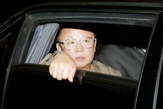 Vladivostok, russia, august 23, 2002, north korean leader kim jong-il looks through the window of his automobile in vladivostok on friday, the korean leader has ended his visit to the ended the city t...