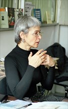 Journalist anna politkovskaya pictured at the novaya gazeta editorial office, politkovskaya arrived to moscow from the usa on october 25 to take part in negotiations with terrorists, holding people ho...