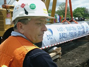 Georgia, may 23, 2003, at a groundbreaking ceremony (in pic) for the georgian stretch of the baku-tbilisi-ceyhan oil pipeline in east georgias tetritskaroid district, on friday, the ceremony to mark t...