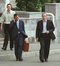 Moscow, russia, july 4, 2003, mikhail khodorkovsky (r), the head of the yukos oil company and russia's wealthiest man, pictured upon leaving the general prosecutor's office