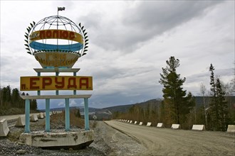 Krasnoyarsk territory, june 2, 2009, the sign at the entrance to the village bears its name yeruda as well as the name of the polyus gold (polyus zoloto) company, located nearby, russian billionaire m...