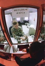 Orenburg, russia, a deposit cash department at a branch of sbs-agro bank, 03,1998.
