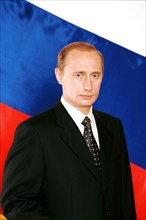 Vladimir putin, president of russian federation pictured with flag of the russian federation 2000.