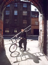 A riga chimney sweep, in modern riga sweeps combine functions of fire inspectors with sweeping chimneys in old buildings, latvia, 2003.