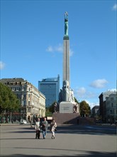 The freedom monument in the center of riga, latvia, 2003, the monument was designed by sculptor k,zale and unveiled in 1935, scenes of latvia's struggle for independence are depicted around the base.