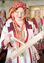 Valentina anisimova, an amateur actress of the mordovia folk group 'norovava' participating in the finno-ugric youth festival in the city of saransk, siberia, russia, earlier this month, 5/96  .