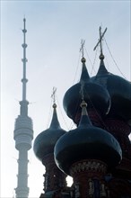 Ostankino tv tower (left), a famous moscow landmark, and church of st,trinity (1692), moscow, russia, 2000.