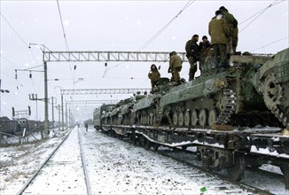 Chechnya, 1/3/97: last russian units leaving chechnya while technical troops such as engineers, railway and rear services stay behind.