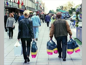 Shoppers on the novy (new) arbat street, moscow, 2001.