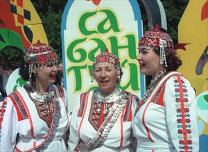 Chuvash, singers from chuvashia, guests at the celebration of the popular tatar holiday sabantui are shown singing, in izmaylovo park, moscow, russia, 7/99, 'sabantui', as translated from the tatar la...