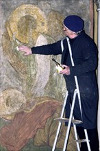Restorer alexander nekrasov restoring a fresco by andrei rublyov at the assumption cathedral of vladimir, the frescos, included in the unesco world heritage list, are in critical condition now, as the...