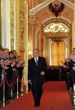 President-elect  vladimir putin heading for the st, andrew hall of the grand kremlin palace for his inauguration, may 6, 2002.